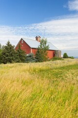 Bright red barn in north Idaho. © Gregory Johnston