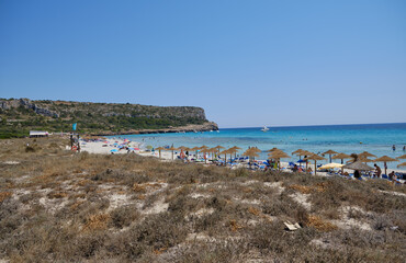 Fototapeta na wymiar Menorca, Spain: Afternoon in Son Bou beach on a cold sunny day, Menorca, Spain