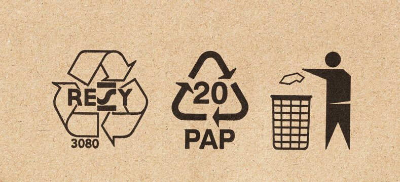 Closeup of a box made with recycled materials with RESY and recycling symbols