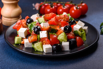 Greek salad with fresh vegetables, feta cheese and black olives