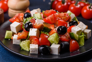 Greek salad with fresh vegetables, feta cheese and black olives