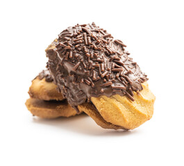 Petit fours with chocolate sprinkles. Mini chocolate dessert.