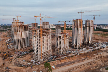 Building construction site. City development. Aerial view from drone