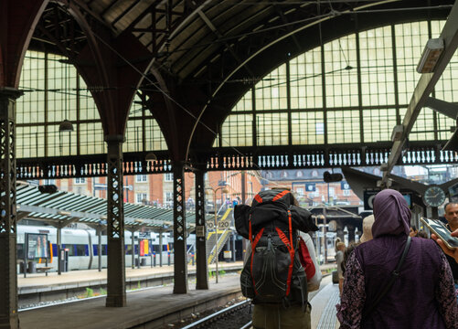 Tourists Waiting For The Next Train In Copenhagen Train Station.