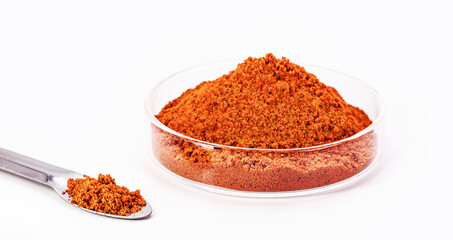 vibrant orange coloring pigment, obtained by dyes or additives, non-polymeric, isolated white background