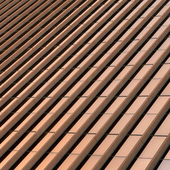Square Building exterior with bronze reflective glass screen at Salt Lake City in Utah