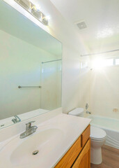 Vertical Sun flare Small traditional bathroom interior with sliding glass window