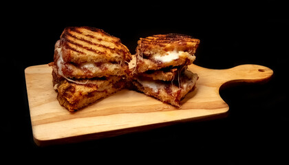 Toasted cheese sandwiches made with Italian smoked Scamorza cheese
