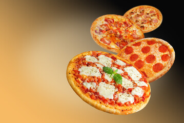 Set of different flying pizzas with a phone on a bright background, such as pepperoni, carbonara,...