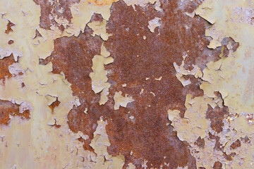 Dark worn rusty metal background, swollen paint.