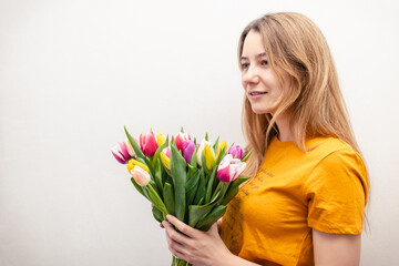 girl with bouquet of tulips