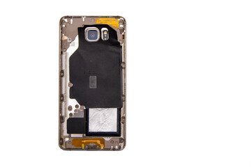 Back side of a broken phone on a white isolated background