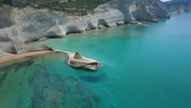 sheer white cliffs of Cape Drastis near Peroulades