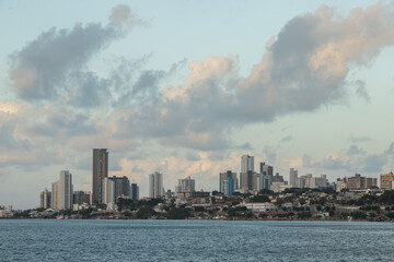 city skyline at sunset, buildings seen from afar, panoramic view of the city of Natal, buildings in the distance, late afternoon, dusk, dawn, tourism in brazil, brazilian landscape, panoramic view