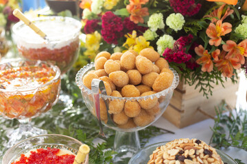 reception at the restaurant, reception table, table setting, buffet, table with food, brazilian snacks, chicken drumsticks, drumsticks


