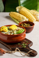 Traditional Ajiaco Colombiano - Colombian Soup with potato, chicken, avocado, common in Colombia, Cuba and Peru. Latin America