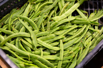 Ripe beans on a market counter. High quality photo