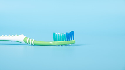 toothbrush on a blue background close-up, dental care.