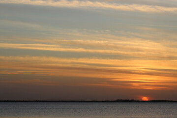 Obraz premium Sunset over Water