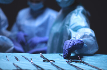 Team surgeon at work in operating