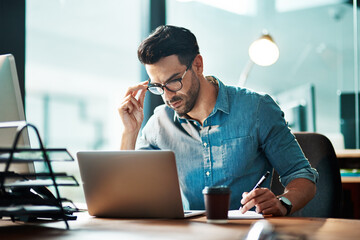 Serious, planning and professional manager reading emails and schedule appointments. Businessman...