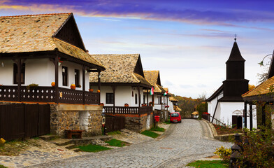 View of picturesque village Holloko with ancient wooden church, Hungary