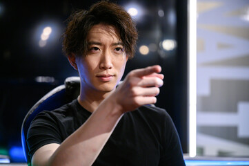 Image of a professional gamer person Pointing © kapinon
