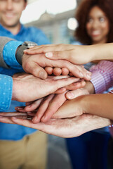 Business people hands stacked showing unity, teamwork and collaboration gesture for meeting a goal. Group closeup of corporate workers, team or community joining, working together and standing united