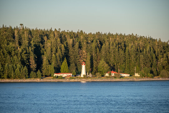 Cape Mudge Lighthuse and beautiful landscape on Quadra Island. View from cruise ship.