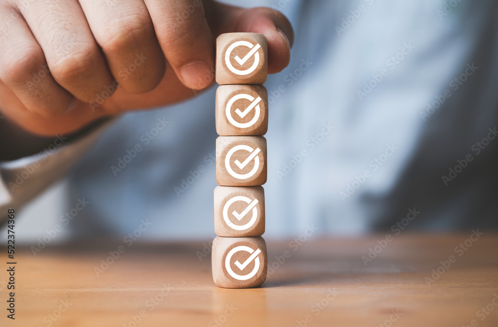 Poster Businessman putting and stacking tick correct sign mark for approve document and project concept.