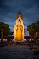 Fototapeta premium Standing Buddha image the landmark in Phitsanulok Province, Thailand.