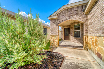 Front door with a brick entryway