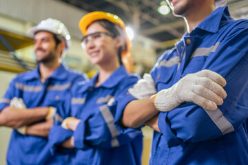 Portrait Group of male and female industrial worker working in factory. © Kawee