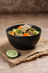 Soto Sapi or Soto Daging, is an Indonesian special soup made from beef broth with meat cutlet. Popular menu for Idul Adha