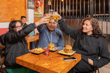 Family toasting in a fast food restaurant