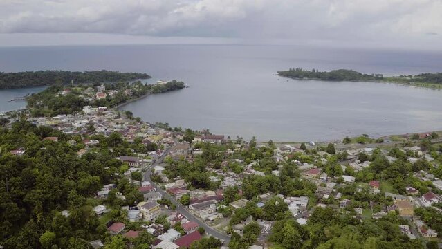 Aerial view of Port Antonio in Jamaica showing the East harbour and rotating around to view Navy Island and the West Harbour.