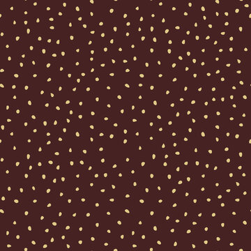 Seamless vector background with random elements. Abstract brown and golden ornament. Seamles abstract pattern