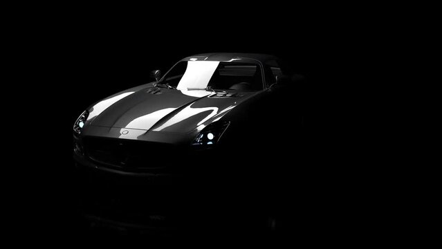 The silhouette of the car slowly emerges from the darkness.