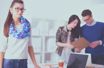 Young business people working at office on new project