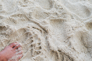 feet walking on the beach