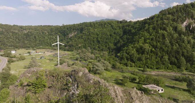 White Grapevine Cross On Top Of Rocky Mountain In Daba, Georgia. - aerial approach