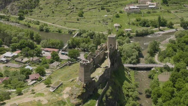 Flying Towards Oldest Ruined Structure Of Khertvisi Fortress On Hilltop Near Khertvisi Village In Meskheti Region, Georgia. Aerial Drone 