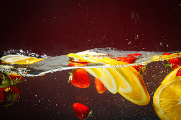 Fototapeta na wymiar Concept of fresh summer fruits, fruits in water