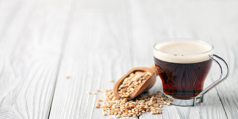 Cup with coffee barley with barley grains. Healthy herbal drink for immunity. Coffee alternatives