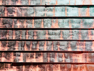 rusted tin metal wall factory building shed siding warehouse loading alley shipping container board ship dock