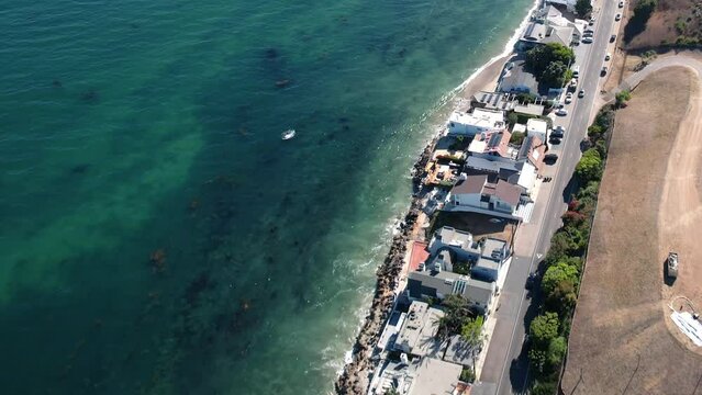 Multi-million dollar luxury beachfront mansions in Malibu, California - aerial flyover