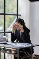 Stress Asian woman business people and work concept, a tired Asian businessman in workplace office...