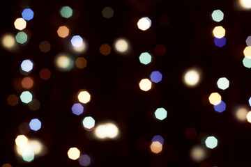 multicolored festive lights on a black background screensaver backdrop