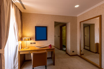 Interior of a hotel room with furniture