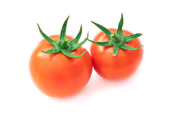 Group of tasty and fresh cherry tomatoes isolated on white background. Rich harvest and healthy juicy fruit and vegetables